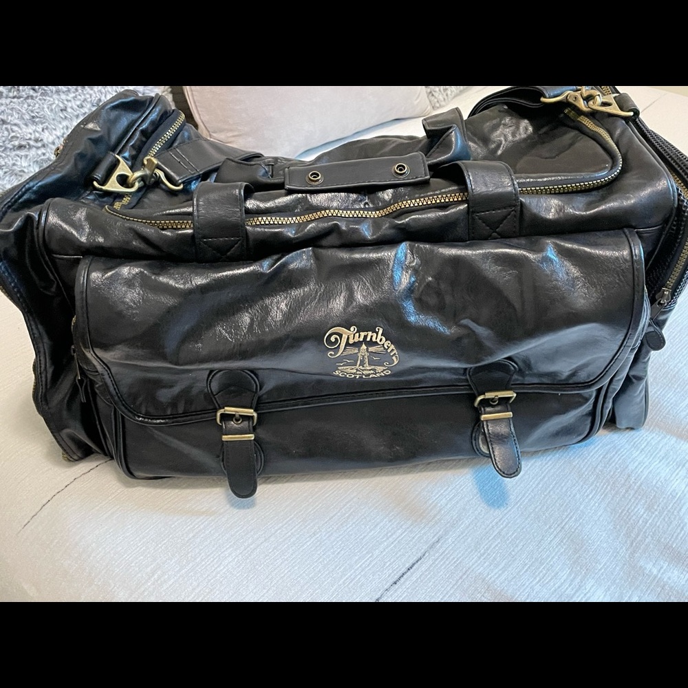 Black leather travel duffel bag